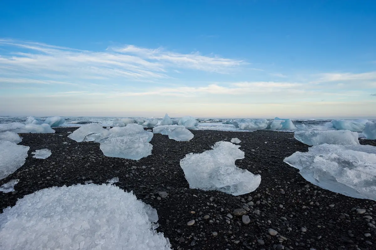 Blocks of ice on the black sand of Diamond Beach